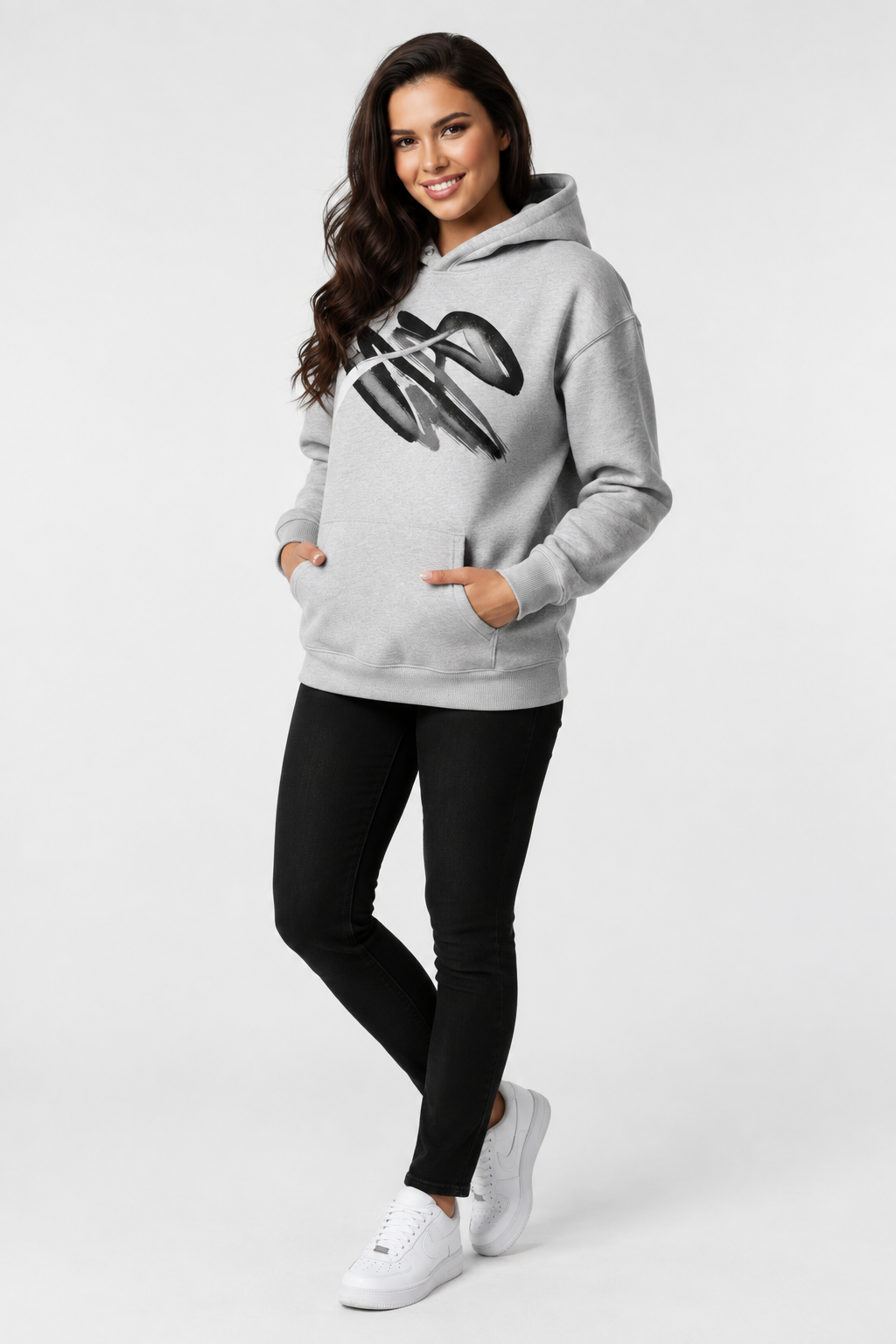 Brunette model in a grey graphic hoodie, 2:3 portrait