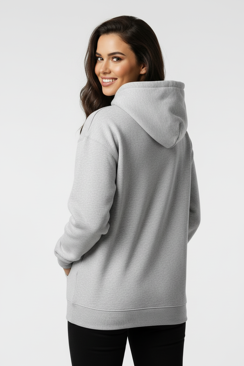 Earlier brunette model from behind, hood down, smiling over her shoulder