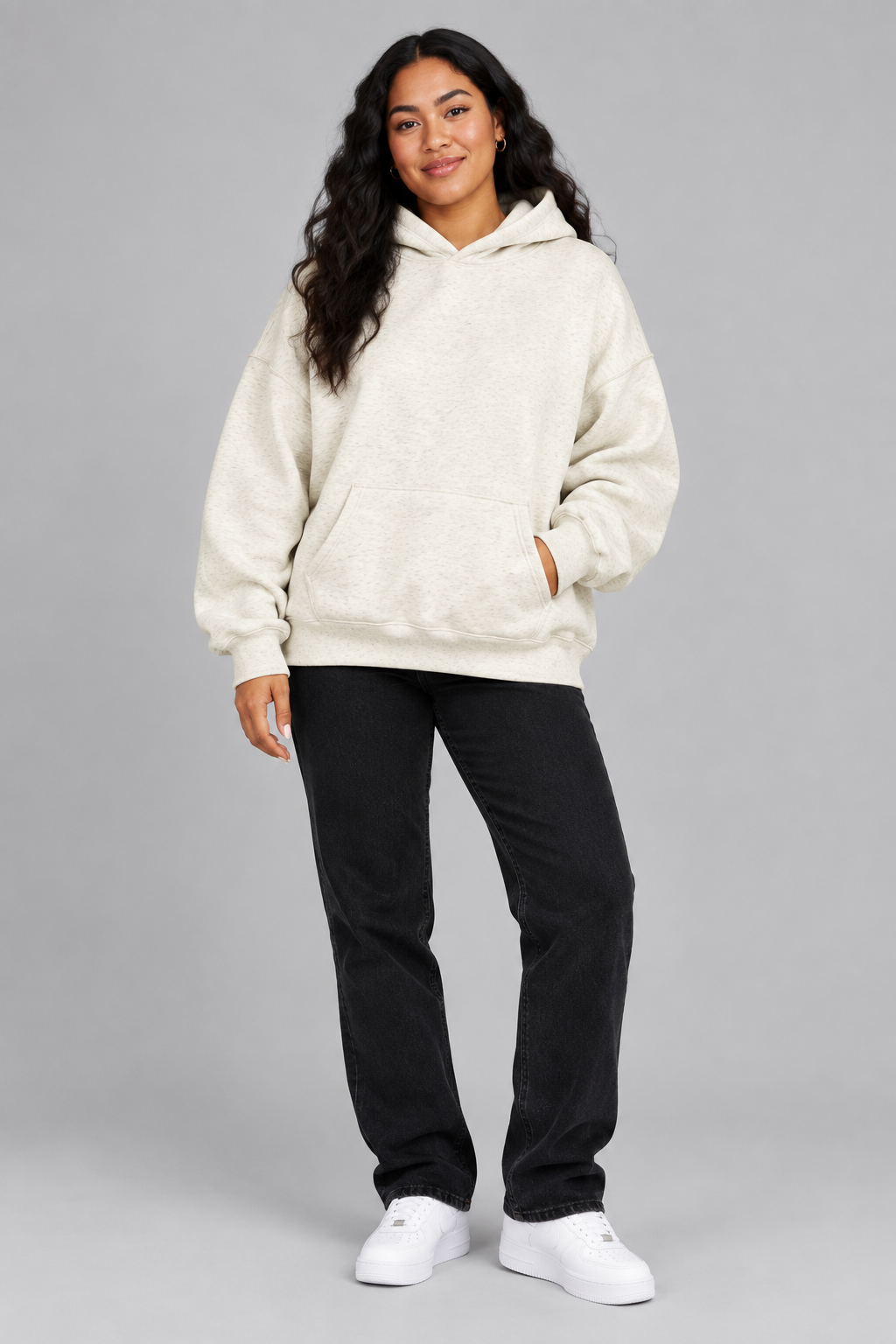 Full-body Islander female model wearing the hoodie