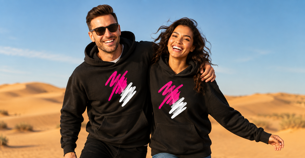 Male and female models together in the desert