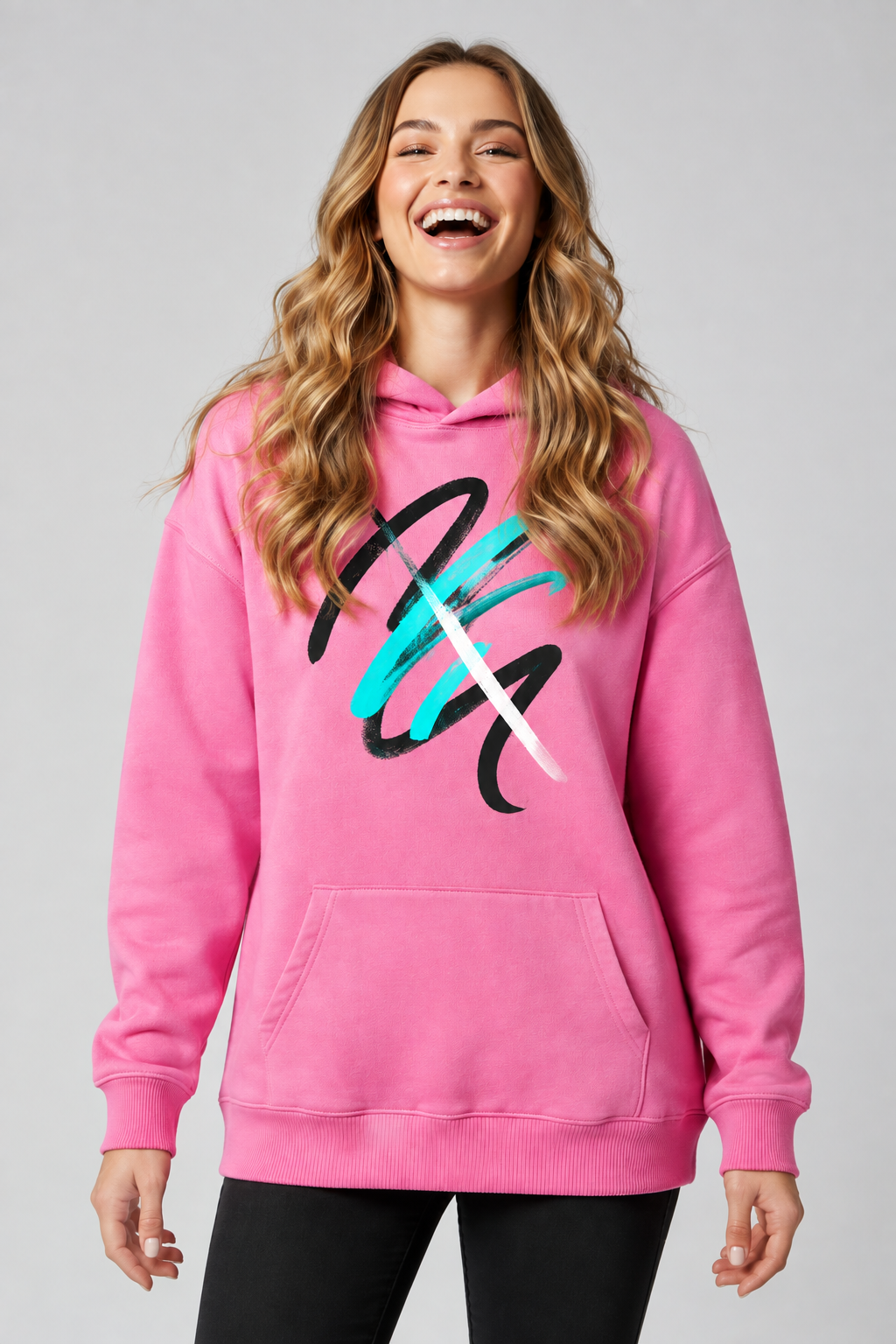 Model wearing the pink graphic hoodie with her entire head in frame