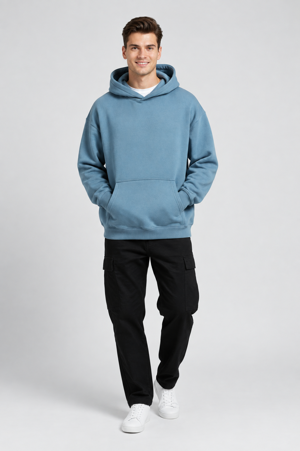 Recreated blue hoodie studio image with a clearly smiling model